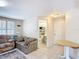 Living room with access to a full bathroom and a side table at 301 Oregon Ave, St Cloud, FL 34769