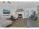 Bright living room with modern fireplace, comfortable seating, and contemporary decor at 3173 Wake Up Ct, Kissimmee, FL 34744
