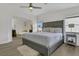 Primary bedroom features a jacuzzi tub, neutral-toned walls and modern decor at 3173 Wake Up Ct, Kissimmee, FL 34744