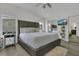 Primary bedroom boasts natural light and calming design elements at 3173 Wake Up Ct, Kissimmee, FL 34744