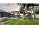 Outdoor living is great in this yard featuring a pool, playground and plenty of room to roam at 3901 Ballinore Pl, Gotha, FL 34734