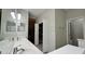 Spacious bathroom with double sinks and a walk-in closet, providing ample space at 3901 Ballinore Pl, Gotha, FL 34734