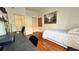 Relaxing bedroom with hardwood floors, a workstation, and closet space at 3901 Ballinore Pl, Gotha, FL 34734