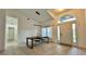 Foyer with a view of the front door, large window, dining room, and a glimpse into other rooms at 3901 Ballinore Pl, Gotha, FL 34734