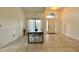 Dining room featuring a view of the front door with decorative window and large windows for natural light at 3901 Ballinore Pl, Gotha, FL 34734