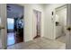 Hallway view to a bedroom, office and laundry, allowing easy access to rooms at 3901 Ballinore Pl, Gotha, FL 34734