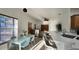 Bright and open living area with kitchen and dining area, with natural light at 3901 Ballinore Pl, Gotha, FL 34734