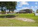 Enjoy your fully fenced backyard with private pool and view from the back porch area at 3991 Island Lakes Dr, Winter Haven, FL 33881