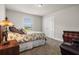 Bright bedroom with carpet, natural light from the window, closet, and stylish furnishings at 3991 Island Lakes Dr, Winter Haven, FL 33881