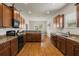 Gourmet kitchen featuring granite counters, stainless steel appliances, and a convenient breakfast bar at 3991 Island Lakes Dr, Winter Haven, FL 33881