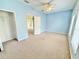 Bright bedroom with carpet and an adjacent closet at 4307 Creeks Run Blvd, Kissimmee, FL 34746
