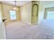 Cozy dining room featuring an alcove and large window at 4307 Creeks Run Blvd, Kissimmee, FL 34746