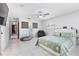 Primary bedroom with tile floors, ample natural light and soothing decor at 4407 Lake Trudy Dr, St Cloud, FL 34769
