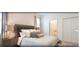 Well decorated bedroom featuring a queen bed, side tables, wardrobe, and neutral decor at 4504 Monado Dr, Kissimmee, FL 34746