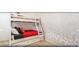 Bedroom featuring bunk beds and Mickey Mouse themed wallpaper at 4504 Monado Dr, Kissimmee, FL 34746