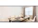 Dining room with black table, seating for eight, and modern decor at 4504 Monado Dr, Kissimmee, FL 34746