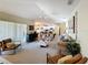 Spacious living room flows to the kitchen area perfect for entertaining and relaxation at 458 Moscato Dr, Davenport, FL 33897