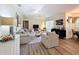 Inviting living room with neutral decor, comfortable seating, and lots of natural light at 458 Moscato Dr, Davenport, FL 33897