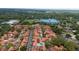 Aerial view of community with mature trees and landscaping including a community pool at 5015 Nassau Cir # 4, Orlando, FL 32808