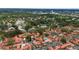 Aerial view of a residential neighborhood with mature trees and pools at 5015 Nassau Cir # 4, Orlando, FL 32808