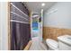 Bathroom leading to the backyard pool with a toilet and shower at 5015 Nassau Cir # 4, Orlando, FL 32808