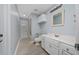 Bathroom features a shower/tub combo and vanity sink with ample storage space at 5015 Nassau Cir # 4, Orlando, FL 32808