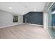 Spacious bedroom with ensuite and lots of bright light coming from windows and sliding glass doors at 5015 Nassau Cir # 4, Orlando, FL 32808