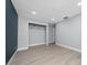 Light and airy bedroom featuring new flooring, fresh paint and recessed lighting at 5015 Nassau Cir # 4, Orlando, FL 32808