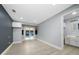 Spacious bedroom features new flooring, neutral paint, a walk in closet and sliding doors to the pool area at 5015 Nassau Cir # 4, Orlando, FL 32808