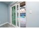 Covered outdoor patio provides access to a screened in pool at 5015 Nassau Cir # 4, Orlando, FL 32808