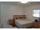 Bedroom featuring a window and neutral walls at 5810 Paradise Ln, Orlando, FL 32808