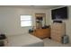 Bedroom featuring natural walls and natural light at 5810 Paradise Ln, Orlando, FL 32808