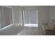 Bright living room with large windows and a comfortable sofa at 5810 Paradise Ln, Orlando, FL 32808