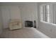 Living room features a stone fireplace and natural light at 5810 Paradise Ln, Orlando, FL 32808
