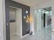 Inviting entryway features neutral tones, decorative lighting, and bright, shiny marble floors at 585 Lucerne Blvd, Winter Haven, FL 33881