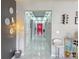 Hallway featuring marble floors and modern lighting at 585 Lucerne Blvd, Winter Haven, FL 33881