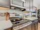Close up of a kitchen with stainless steel appliances and tile backsplash at 605 San Augusto Dr, Kissimmee, FL 34759