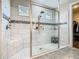 The main bathroom features a spacious walk-in shower and plenty of natural lighting at 605 San Augusto Dr, Kissimmee, FL 34759