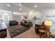 Spacious living room with couches, accent chairs, and easy access to the kitchen at 6644 Sw 179Th Court Rd, Dunnellon, FL 34432
