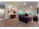 Open-concept living room with modern furniture and lots of natural light at 6644 Sw 179Th Court Rd, Dunnellon, FL 34432
