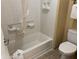Bathroom featuring a clean tub, shower, and toilet, providing essential facilities at 7601 Canada Ave, Orlando, FL 32819