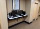 Well-equipped business center with computers and workspace, perfect for professionals at 7601 Canada Ave, Orlando, FL 32819