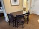 Dining area featuring a table and chairs, offering a space for meals at 7601 Canada Ave, Orlando, FL 32819