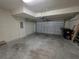 Spacious two car garage with an automatic garage door opener at 1069 Pavia Dr, Apopka, FL 32703