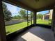 Relaxing screened-in porch overlooking the beautiful backyard at 1069 Pavia Dr, Apopka, FL 32703