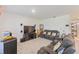 Spacious living room with comfortable seating, a large TV, and ample space for entertaining guests at 1102 Tupelo Trl, Haines City, FL 33844