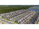 Aerial view of a large residential neighborhood near lakes and forests at 11328 Listening Dr, Orlando, FL 32832