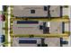 Aerial view of a residential neighborhood with homes with solar panels at 11328 Listening Dr, Orlando, FL 32832