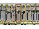 Aerial view of a residential neighborhood with homes with solar panels at 11328 Listening Dr, Orlando, FL 32832