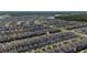 Aerial view of a suburban community with well-maintained homes and green spaces at 11328 Listening Dr, Orlando, FL 32832